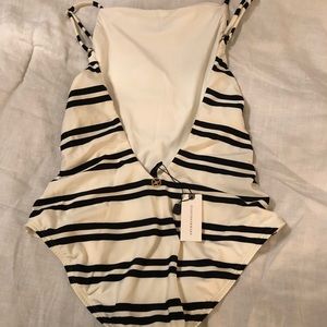 Anthropologie one-piece swim with low v back.